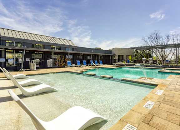 Swimming Pool with lounges at The Landings at Brooks City-Base Apartments , TX, 78235