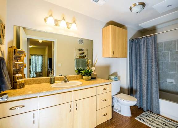 a bathroom with a sink toilet and shower at Villa Espada Apartments, San Antonio, TX, 78221
