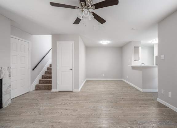 Empty room with ceiling fan at Brook Meadow Village, Austin, TX
