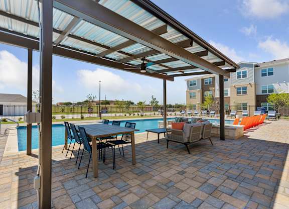 Swimming Pool With Lounge Chairs at Cobalt, Texas, 76131