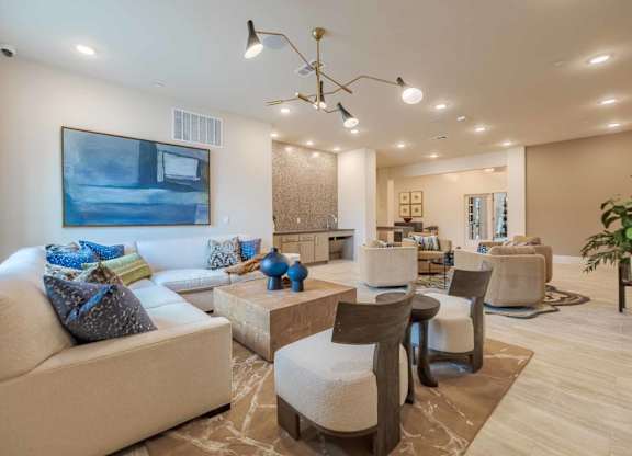 Clubhouse lounge with contemporary furnishings and seating areas at Emilia Apartments, Boerne, TX 78006