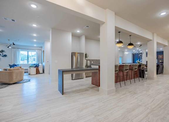 Spacious open floor plan with multiple seating areas at Emilia Apartments, Boerne, 78006