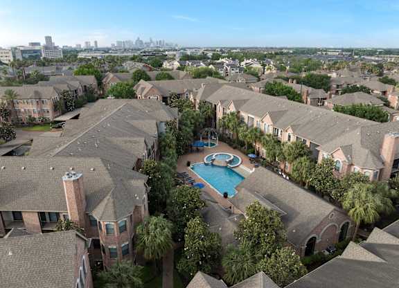 Aerial view of apartment community with resort style pool at Melia Medical Center Apartments, Texas