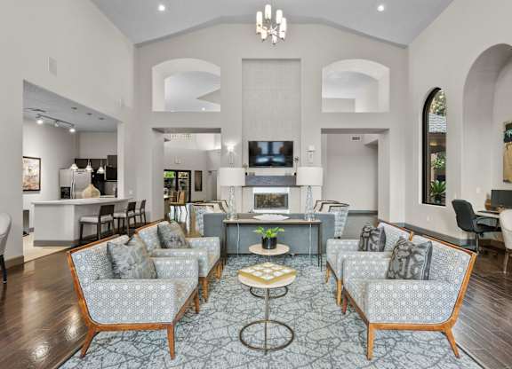 Open concept living room with arched doorways at Melia Medical Center Apartments, Texas, 77054