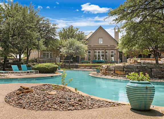 A house with a pool in the backyard.