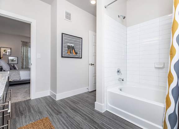 Bathroom with white subway tile and modern fixtures at Sienna at Westover Hills Apartments, Texas