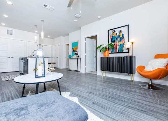 Open living area with modern furniture and colorful accents at Sienna at Westover Hills Apartments, San Antonio, 78253