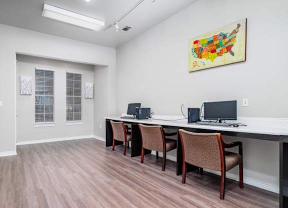 Business center with computer workstations at Houston Street Townhomes Apartments, San Antonio, TX