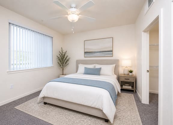 Bedroom with window at Terracina at Lancaster | Affordable Apartments, Lancaster, CA, 93535