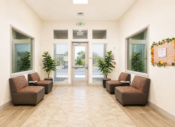 Hallway with chairs at Terracina at Lancaster | Affordable Apartments, Lancaster, 93535