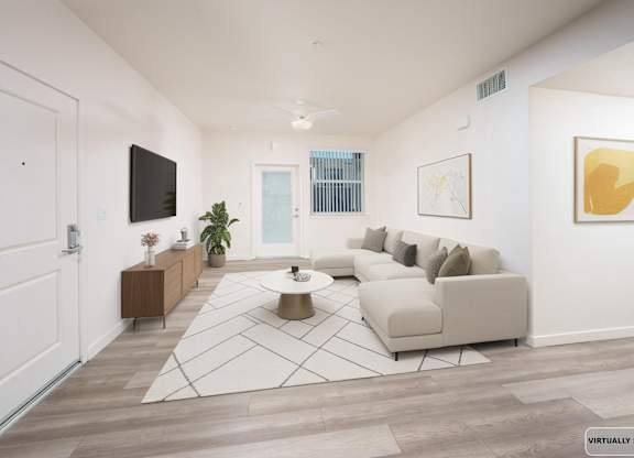 Living Room with white couch at Terracina at Lancaster | Affordable Apartments, Lancaster, 93535
