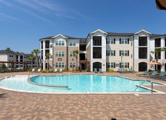 Relaxing Area by the Pool at Abberly Crossing Apartment Homes by HHHunt, Ladson
