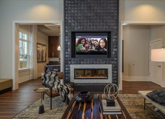 Club Room With Standard Fireplace at Abberly at Southpoint Apartment Homes by HHHunt, Virginia, 22407