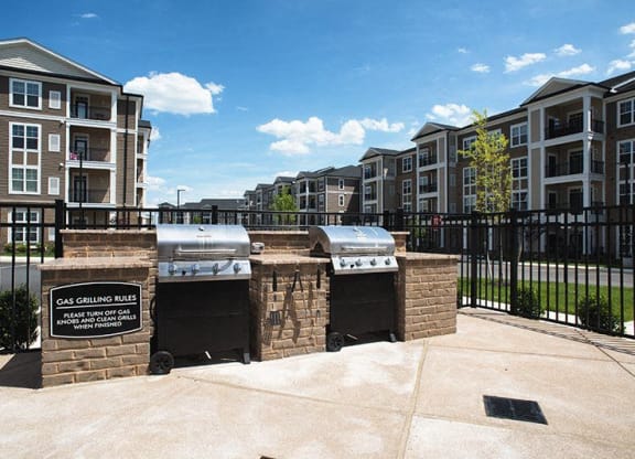 Outdoor Space Grilling Kitchen at Abberly at Southpoint Apartment Homes by HHHunt, Fredericksburg, VA