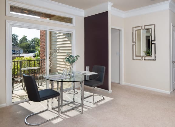 Comfy Chairs With Eating Table at Abberly Village Apartment Homes by HHHunt, West Columbia, SC