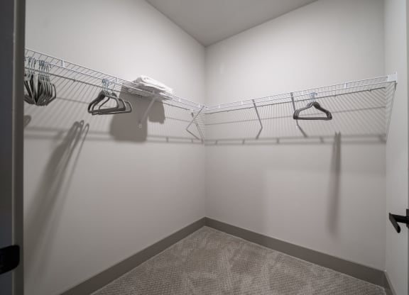 a walk in closet in a bedroom plus den unit at the casey, 2100 delgan at Abberly Foundry Apartment Homes, Nashville