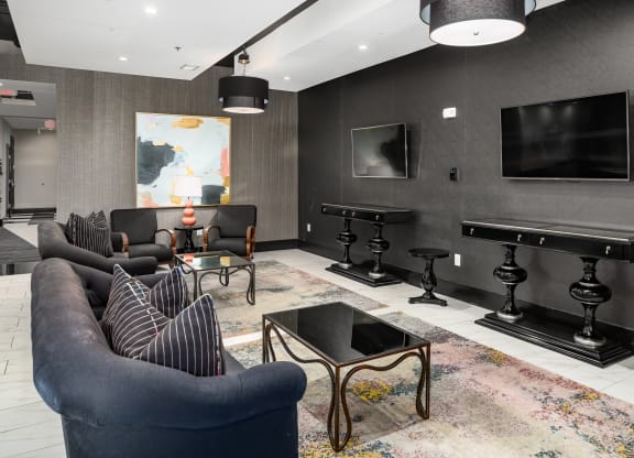 Lounge With TV at Abberly Onyx Apartment Homes, Decatur, Georgia