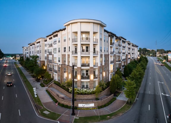 an aerial view of a large apartment building at dusk  at Abberly Onyx Apartment Homes, Decatur, 30033