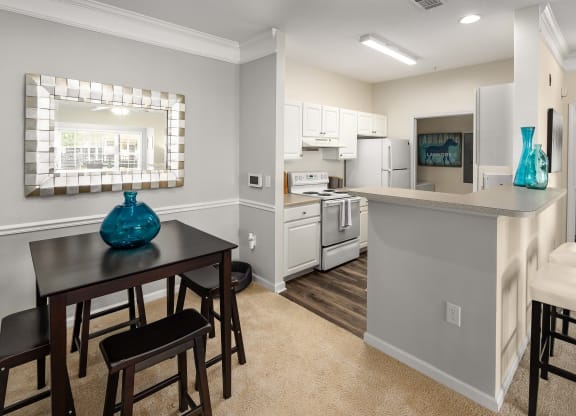 Dining Area and Kitchen at Abberly Woods Apartment Homes, Charlotte, North Carolina