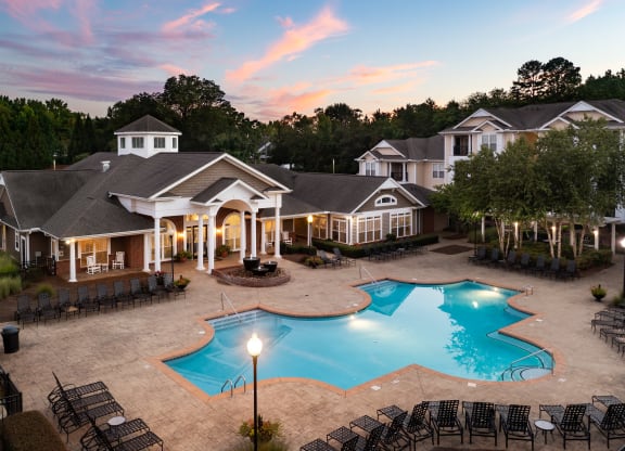 Outdoor Pool During Dusk at Abberly Woods Apartment Homes, Charlotte, North Carolina