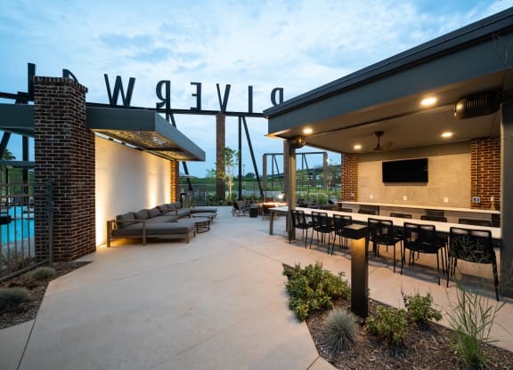 a view of the patio and outdoor seating area at wayzata apartments at Abberly Riverwalk Apartment Homes, Nashville, 37228