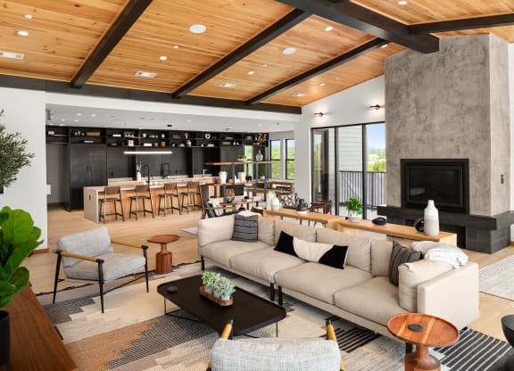 a living room filled with furniture and a large fireplace at Abberly Riverwalk Apartment Homes, Tennessee, 37228