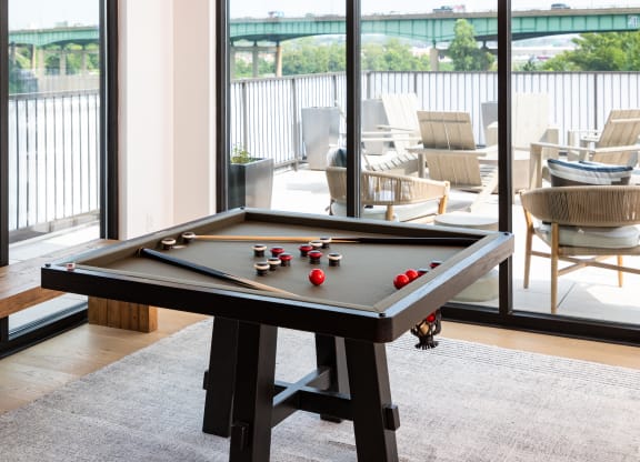 a pool table in the clubhouse  at Abberly Riverwalk Apartment Homes, Nashville, 37228