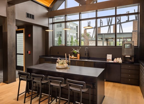 a kitchen with a large island and a large window at Abberly Riverwalk Apartment Homes, Nashville, TN, 37228