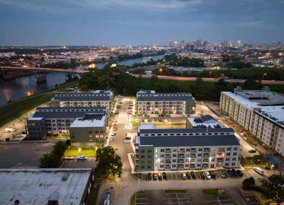 an aerial view of the campus at night with the city of minneapolis in the background  at Abberly Riverwalk Apartment Homes, Nashville, Tennessee