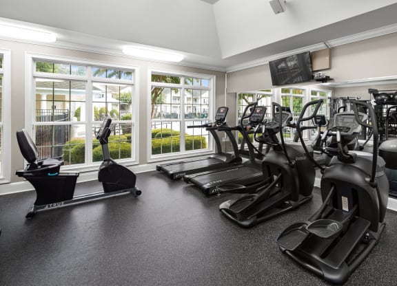 Gym with cardio equipment at Abberly Grove Apartment Homes, North Carolina, 27610