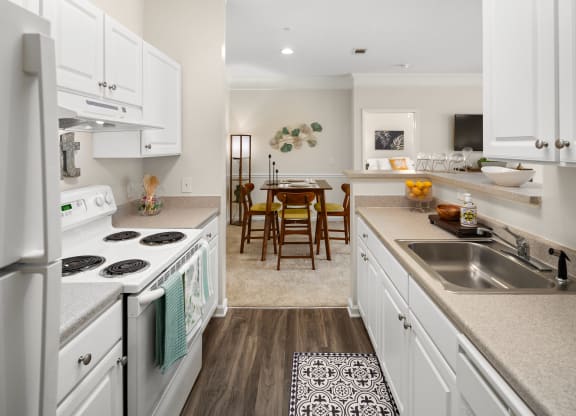 Kitchen and dining area at Abberly Grove Apartment Homes, North Carolina