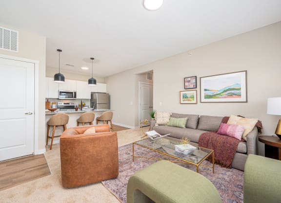 a living room with a couch and a table