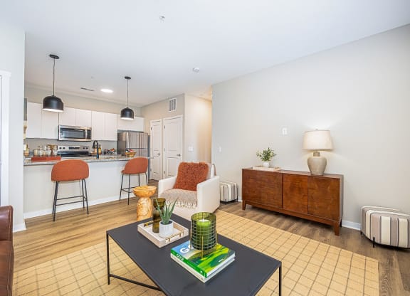 a living room with a couch and a table