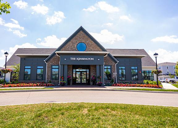 The front of a building with a sign that says "The Kensington".