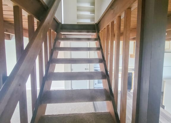 looking down the stairs from the second floor