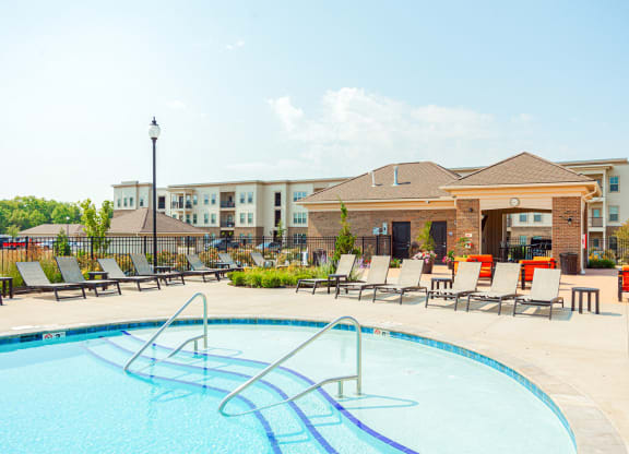 our apartments offer a swimming pool with chaise lounge chairs