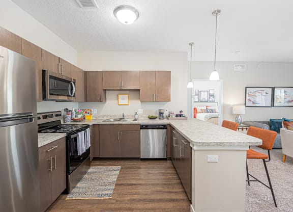 our spacious kitchens are equipped with stainless steel appliances and granite counter tops