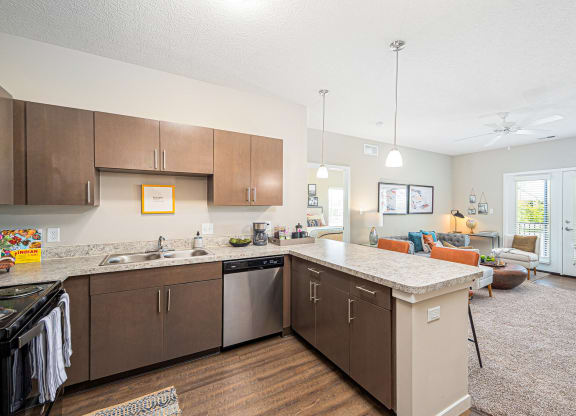 a kitchen with a counter top and a sink