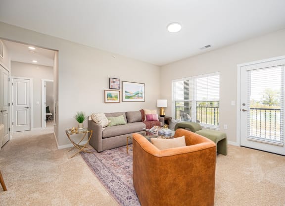 a living room with a couch and a chair