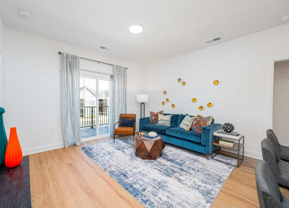a living room with a blue couch