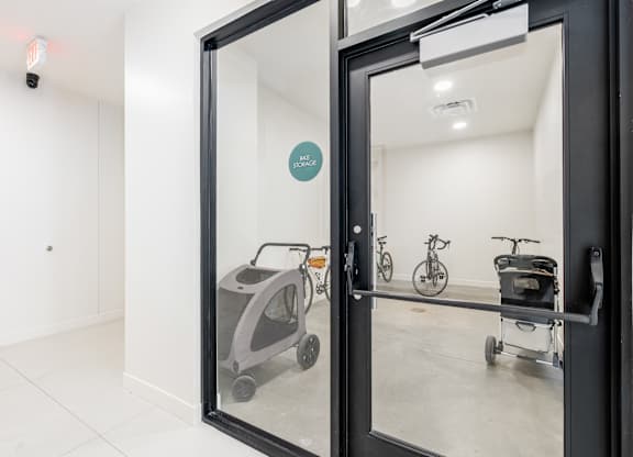 A glass door with a sign that says