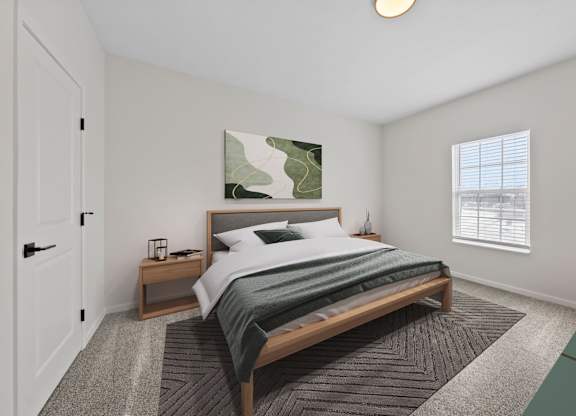 A bedroom with a large bed and a painting on the wall.