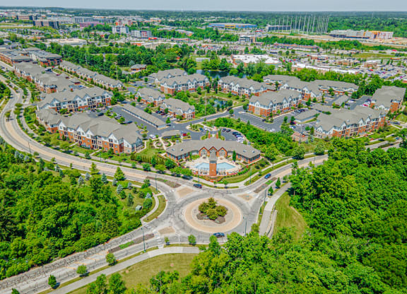 an aerial view of a neighborhood with houses and trees