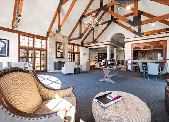 A large room with a high ceiling and wooden beams.