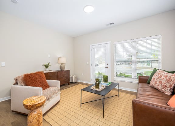 a living room with a couch and a coffee table