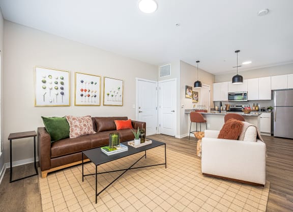 a living room with a couch and a table