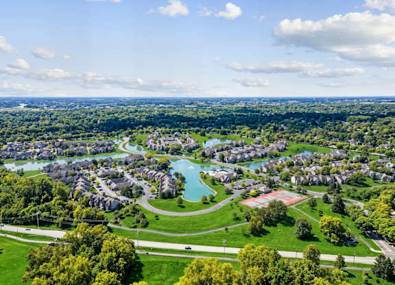 A view of a residential area with a river running through it.