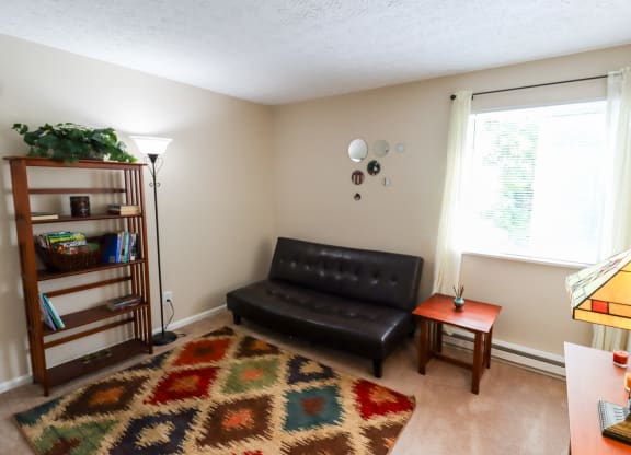 a living room with a couch and a coffee table