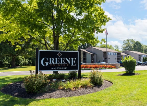 the sign in front of greene country club
