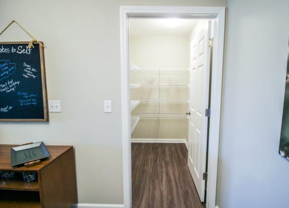 a walk in closet in a 555 waverly unit